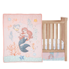 Bedtime Originals Disney Baby Little Mermaid fitted sheet close-up showing elastic all around for secure fit