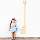 BeeGreeny elephant growth chart on wall showing six-foot height range for kids