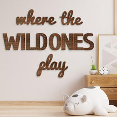 Beeveer Where the Wild Ones Play sign close-up in brown wood finish for a cozy playroom.
