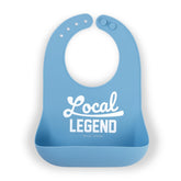 Bella Tunno baby bib with open-pocket catching crumbs during meals.