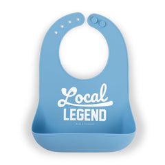 Bella Tunno baby bib with open-pocket catching crumbs during meals.