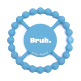 Bella Tunno Bruh teether held by baby shows easy grip for tiny hands and natural soothing.