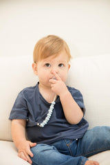 Bella Tunno pacifier clip stainless clip detail ensures secure attachment without rust.