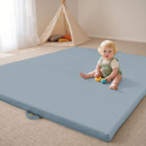 Bella's Friends foldable play mat folded with handles for easy on-the-go use