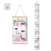 BESSLEE canvas kids growth chart mounted on wall with floral design for stylish nursery decor