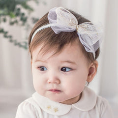 Bethynas baby bow headband closeup lace for gentle everyday wear