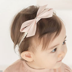 Bethynas baby headband with bow-knot lace for elegant newborn styling.