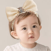 Bethynas Princess Crown Lace Bowknot Headband front view, soft gauze for all-day baby comfort