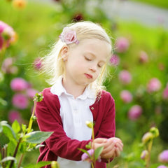 BFNAAgirl baby girl bows clip closeup showing vibrant petals for adorable everyday outfits.
