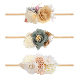 BFNAAgirl headbands flower closeup highlights soft petals for comfy, cute newborn styling.