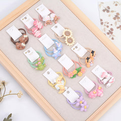 BIANHUAN hair ties on baby girl ponytail illustrating gentle hold for delicate hair