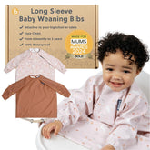 BIBaDO coverall bib on baby during mealtime keeps clothes clean and comfy.