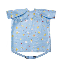 BIBaDO coverall bib on a baby at mealtime keeps outfits clean.