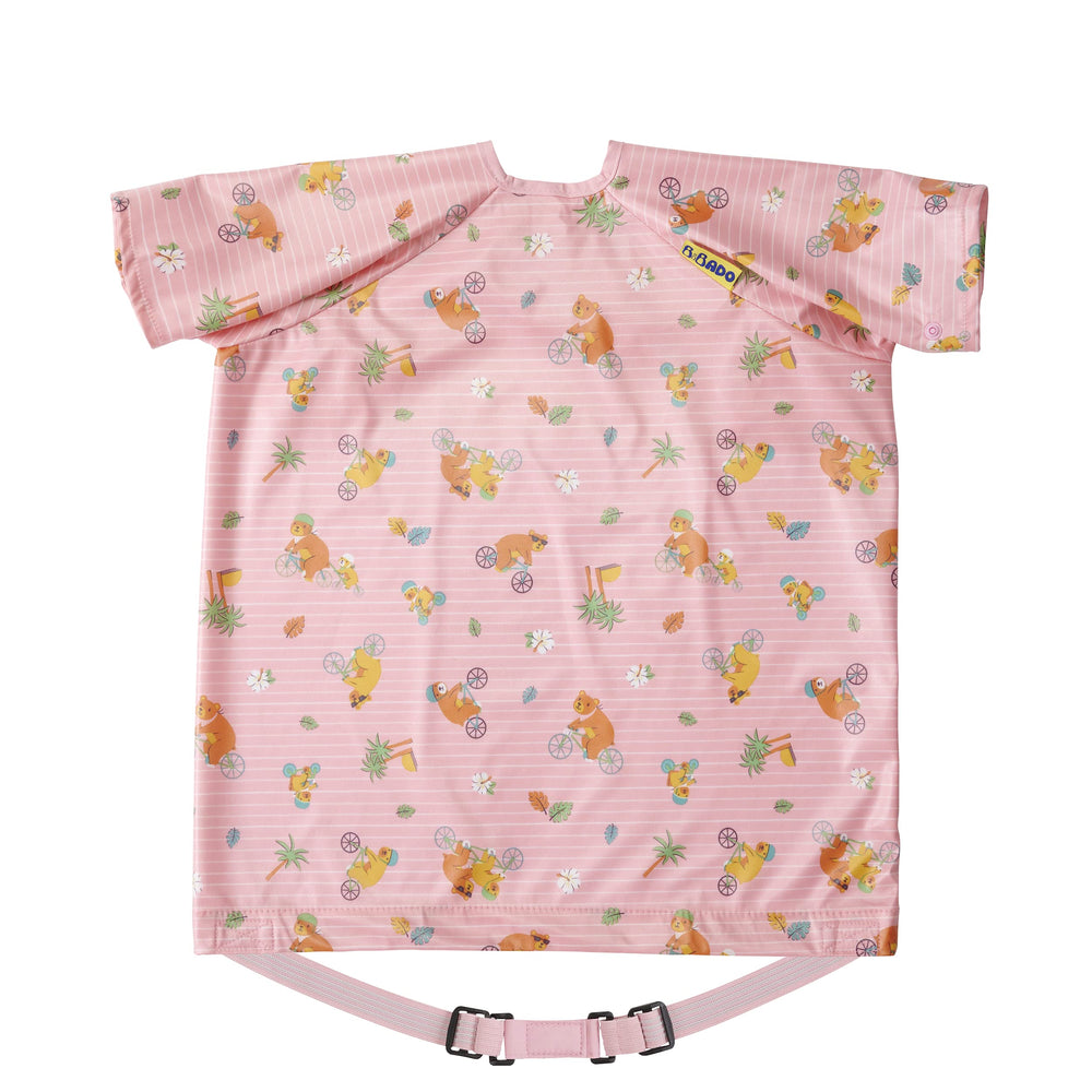 BIBaDO Coverall Bib on baby showing mess-free feeding with waterproof fabric.