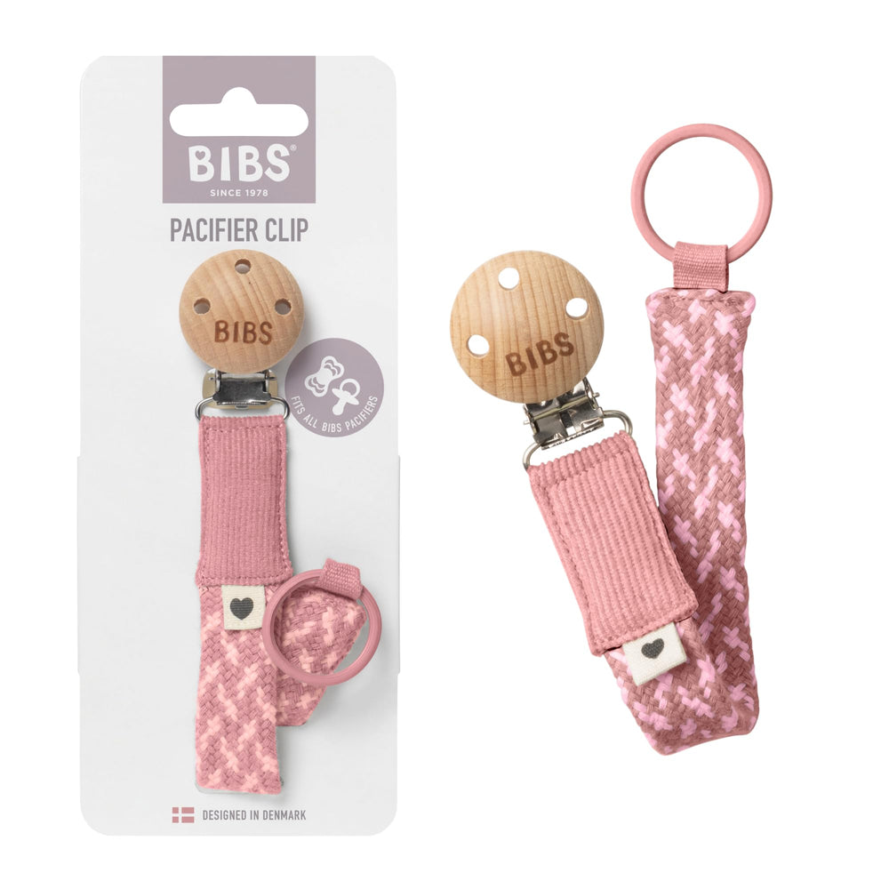 BIBS Paci Braid Dummy Chain in dusty pink keeps pacifiers handy during outings.