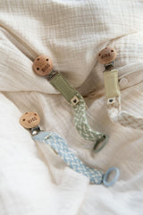 BIBS Paci Braid soft texture closeup highlights gentle feel against baby's skin.