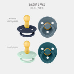 BIBS Colour Four Pack shown in a baby's hand for easy rotation