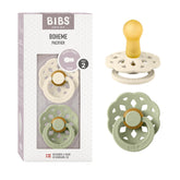 BIBS Pacifiers Boheme Ivory-Sage set in hand for soothing baby comfort.