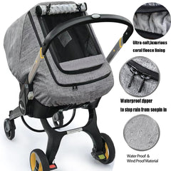 BigHippo gray melange side view car seat cover shields baby from wind.