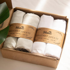 Biloban baby bassinet sheets 4-pack folded grey shows ultra-soft, breathable microfiber for comfortable naps.