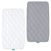 Biloban bassinet mattress pad cover close-up shows quick-fit elastic edge for easy mounting
