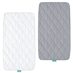 Biloban bassinet mattress pad cover close-up shows quick-fit elastic edge for easy mounting