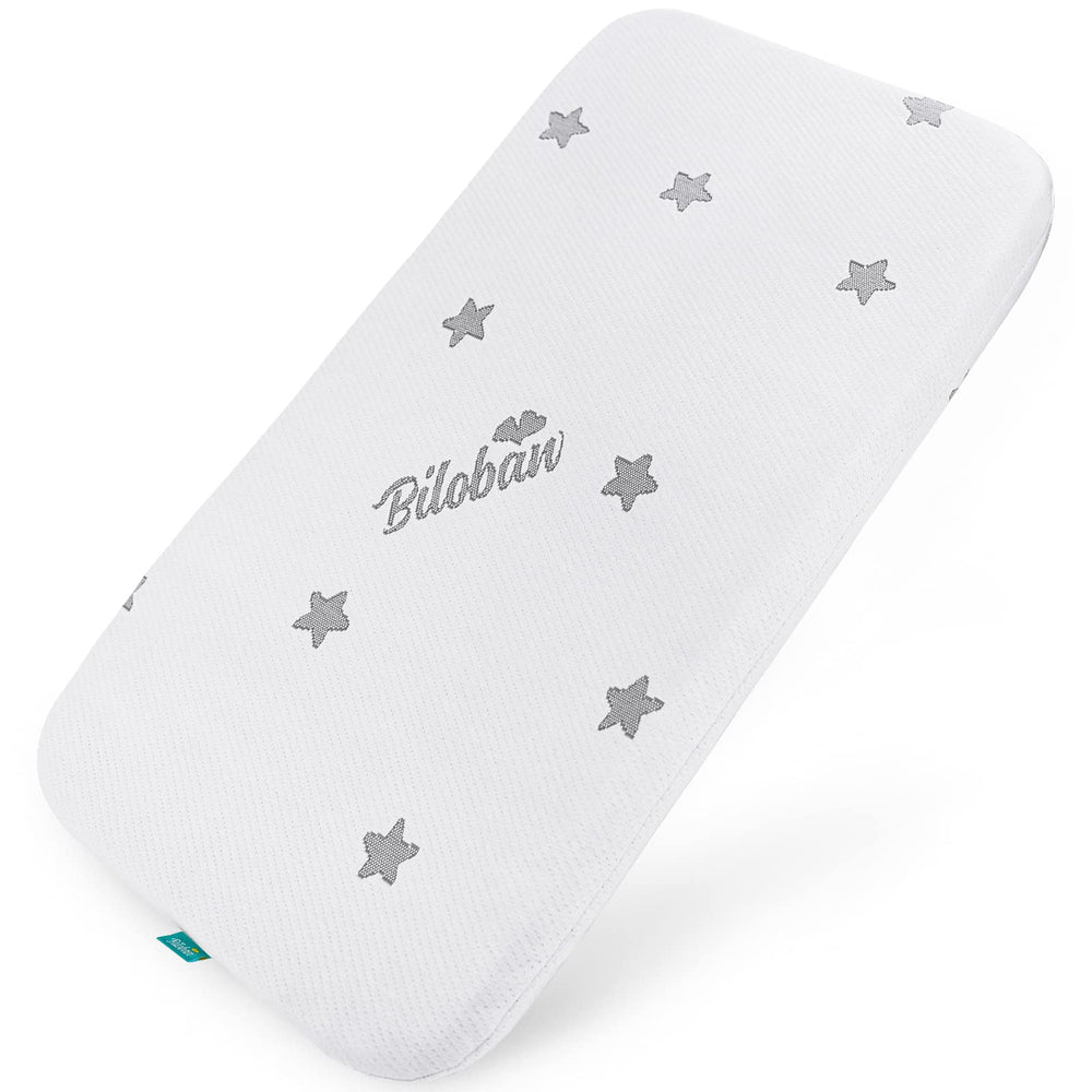 Biloban bassinet pad 32x16 fit close-up shows soft jacquard surface for baby comfort