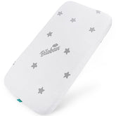 Biloban bassinet pad 32x16 fit close-up shows soft jacquard surface for baby comfort