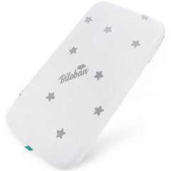 Biloban bassinet pad 32x16 fit close-up shows soft jacquard surface for baby comfort