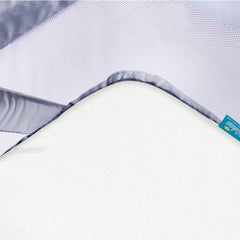 Biloban bassinet sheet white close-up highlighting soft, breathable fabric