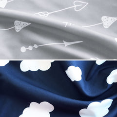 Biloban bassinet sheets elastic edge demonstrated for secure snug fit