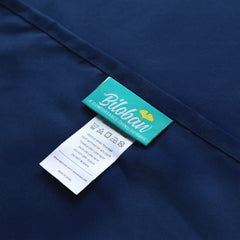 Biloban cot sheet navy on cot in classroom showing fit for daytime naptime