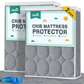 Biloban crib mattress protector closeup showing reinforced edges for a snug, durable fit.