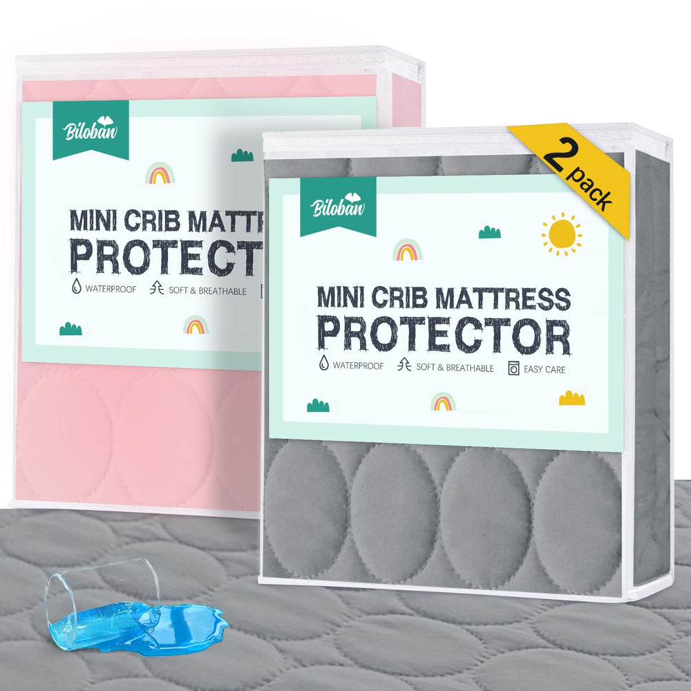 Biloban mini crib protector with soft-padded surface for a cozy sleep.