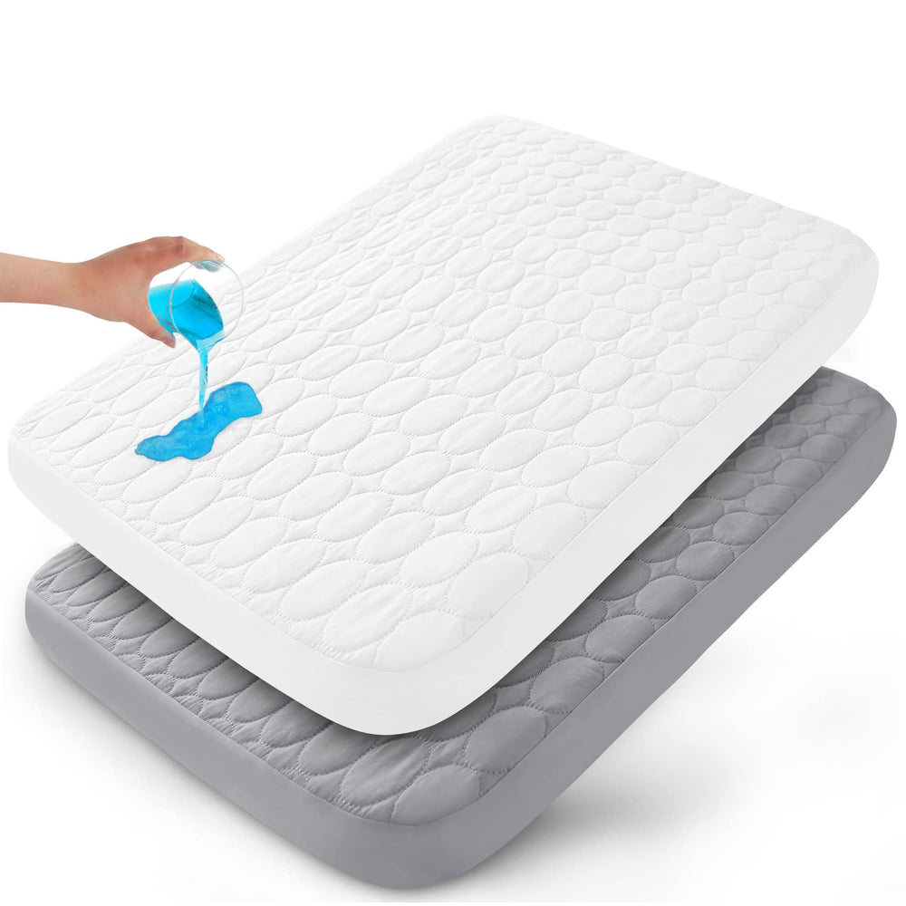 Biloban pack and play sheets top view show a quilted protector designed for cozy naps