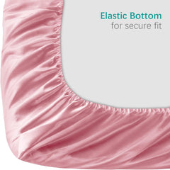 Biloban satin mini crib sheets cooling fabric closeup highlights smooth texture.