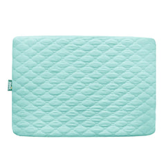 Biloban waterproof playard sheet in aqua keeps mattress dry during playtime and naps.
