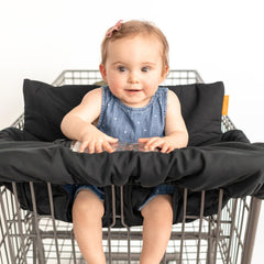 Binxy Baby Cushy High Chair Cover folded with carrying strap for easy travel