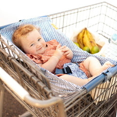 Binxy Baby shopping cart hammock attachment demonstrates quick setup for safer shopping with infant seat.