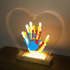 Bixinyo family handprint kit base displays timeless keepsakes.