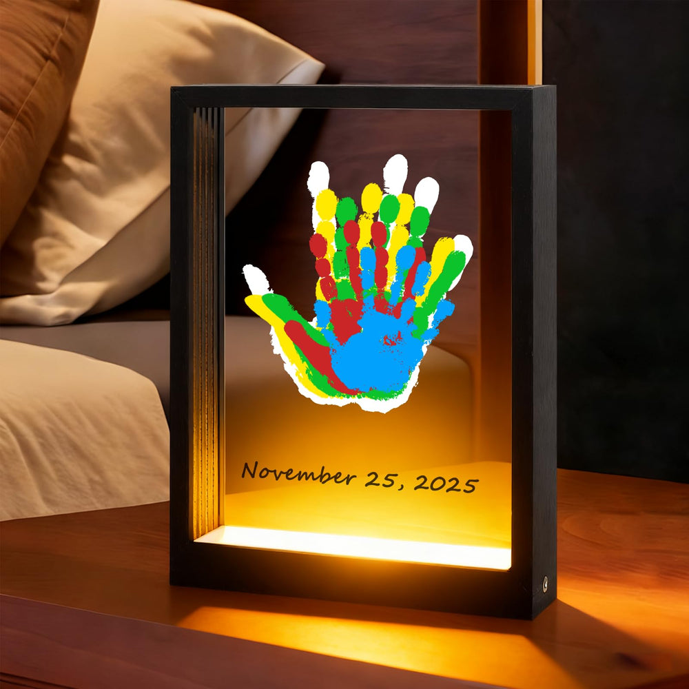 Bixinyo Family Handprint Kit light frame shows cozy nursery keepsake.