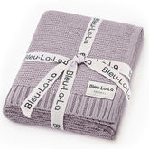 Bleu La La Heritage Knit swaddle blanket closeup shows soft cotton texture for gentle skin.
