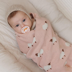 Bleu La La knit cotton texture highlights cozy, breathable warmth for year-round baby comfort.