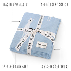 Bleu La La nursery decor swaddle blanket enhances crib setup with universal warmth.