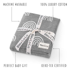 Bleu La La Rainbow Grey receiving blanket in crib demonstrates cozy, breathable comfort from 100% cotton.
