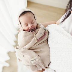 Bleu La La receiving blanket oatmeal folded shows compact size for travel-friendly snuggles