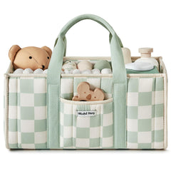 Blissful Diary checkered diaper caddy sage-green in nursery organizes diapers and wipes elegantly.