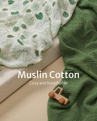 Blissful Diary dark green bassinet sheet with boho vibe enhances nursery decor.