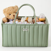 Blissful Diary diaper caddy in sage green keeps newborn essentials within reach for quick changes.