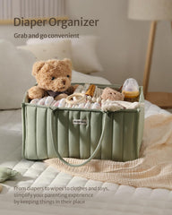 Blissful Diary diaper station caddy complements nursery decor while organizing baby items.